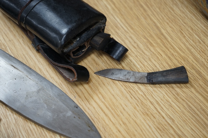 Two leather cased kukri, 43cm long. Condition - good